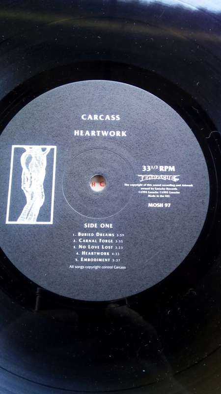 Carcass-Heartwork,UK press. Vinyl EX, Sleeve tear(see pics)