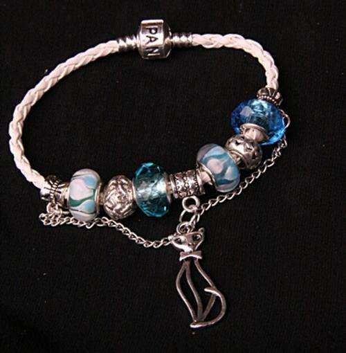 BEAUTIFULL 925 STERLING SILVER AND WHITE LEATHER PANDORA BRACELET