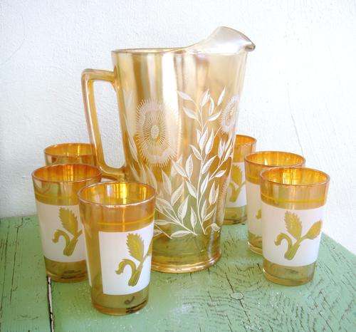 A set of pearlescent drinking glasses and jug