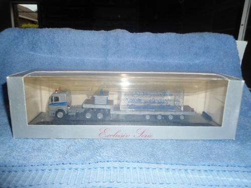 Herpa H0 M/Benz Mechanical Horse and multi wheeled stepframe lowbed trailer with showcase container"