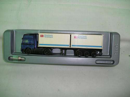 A Schuco die-cast HO model MAN T/T and trailer