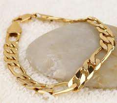 **WORTH R1 299.00** FIGARO BRACELET PLATED IN 9ct GOLD - 5mm x 210mm