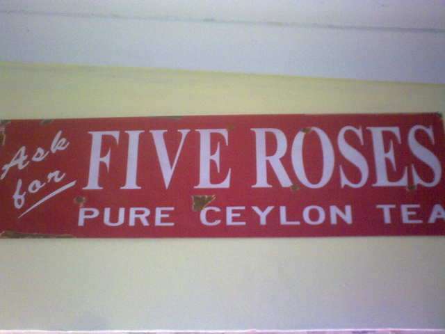Five Roses Metal Sign.