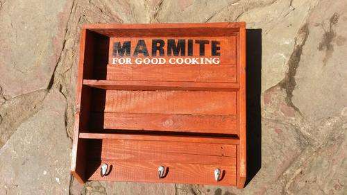 Rustic Marmite Display Unit with shelves and hooks.