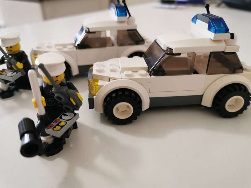 Pair of Lego city police cars no. 7236 auction for two cars as per photo.