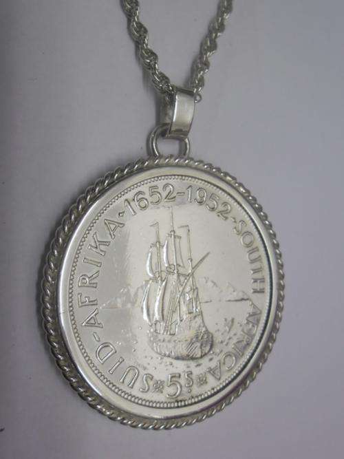 1652-1952 silver 5 shilling in frame with chain