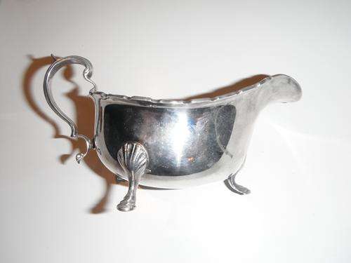 beautiful old gravy bowl
