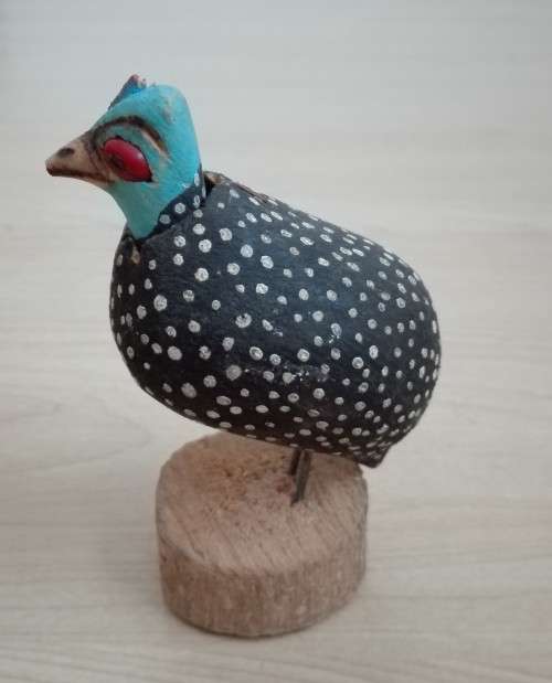 Small Wooden Guinea 7cm. depth 4cm