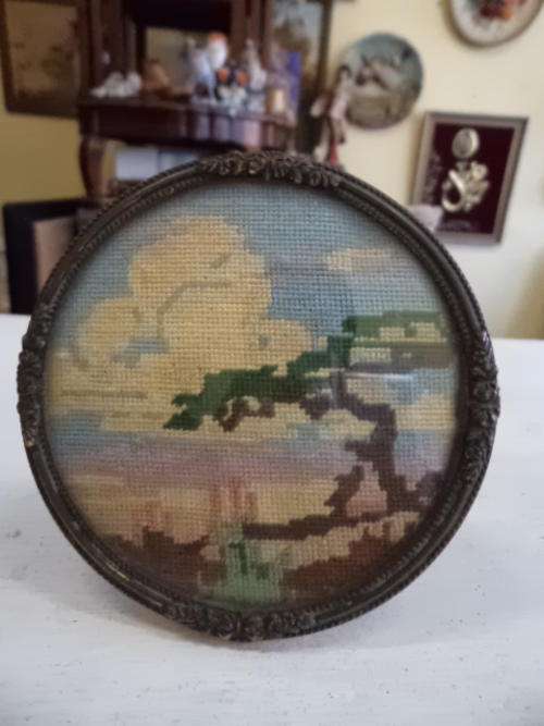 Tapestry Image in a Round Metal Frame