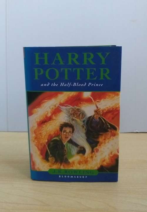 Harry Potter and the Half-Blood Prince by by J.K. Rowling (Hardcover)