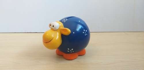 Cow Figurine Money Box