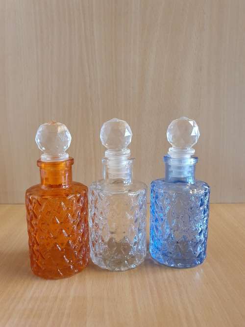 Set of 3 Small Glass Bottles - height 10cm. width 5cm