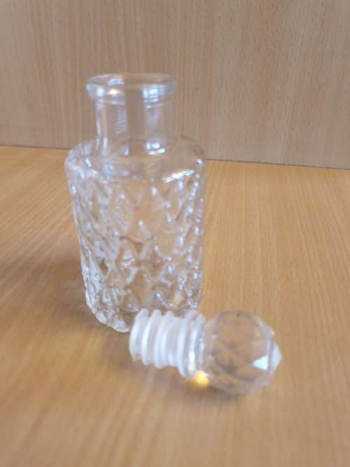 Set of 3 Small Glass Bottles - height 10cm. width 5cm