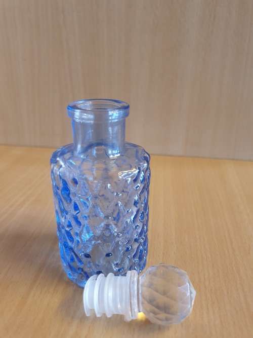 Set of 3 Small Glass Bottles - height 10cm. width 5cm