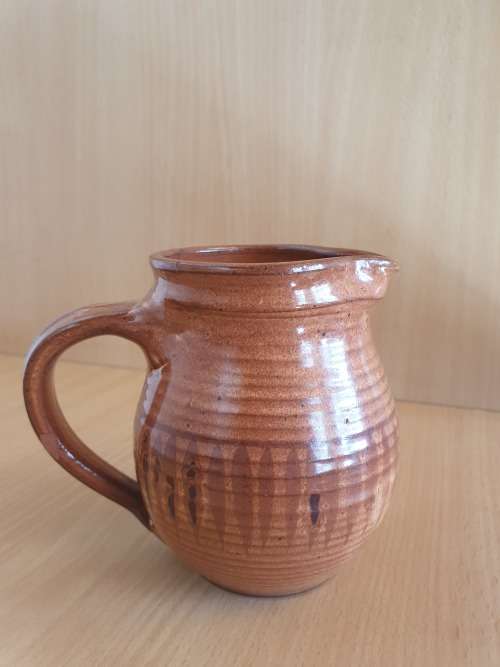 Pottery Jug - height 12cm. width 10cm