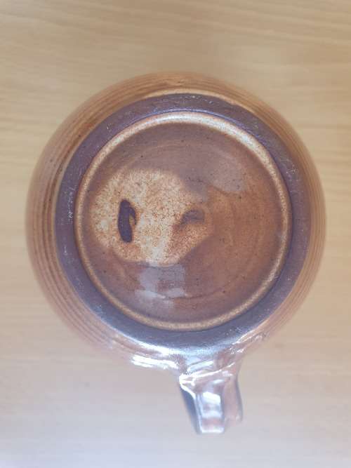 Pottery Jug - height 12cm. width 10cm