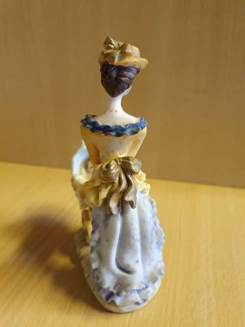 Female Figurine with Pram & Baby