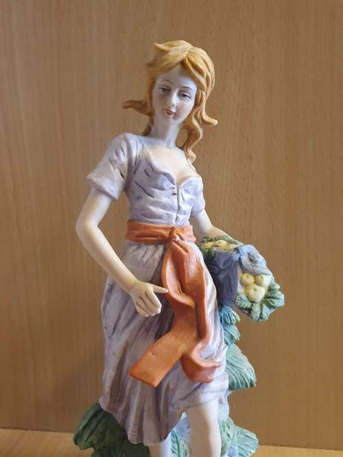 Female Figurine (height 24cm width 13cm)