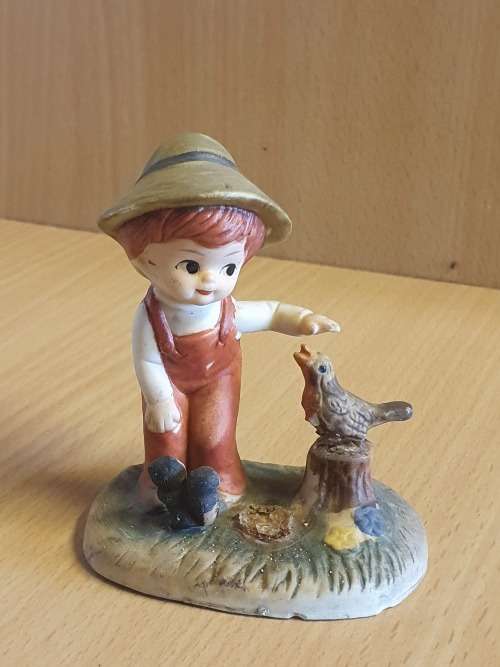 Tivoli - Boy Figurine (height 7cm width 7cm)