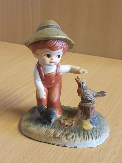 Tivoli - Boy Figurine (height 7cm width 7cm)