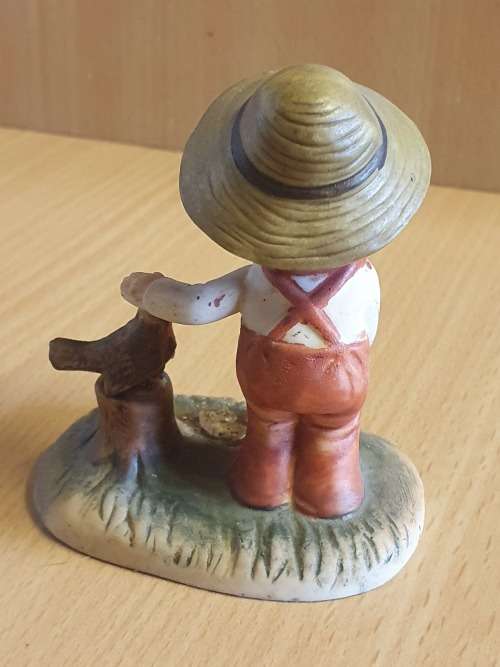 Tivoli - Boy Figurine (height 7cm width 7cm)