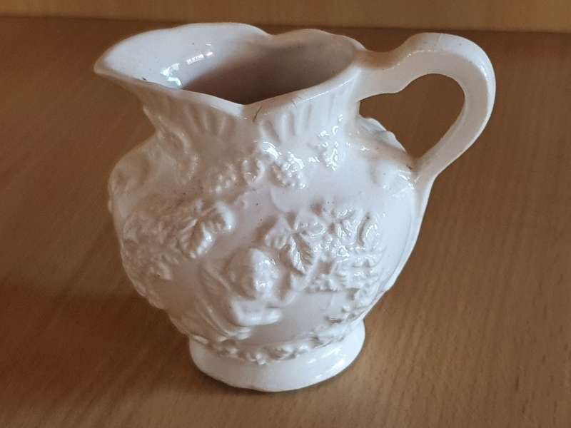 Small White Embossed Angel Figurine Ceramic Milk Jug - width 10cm height 8cm