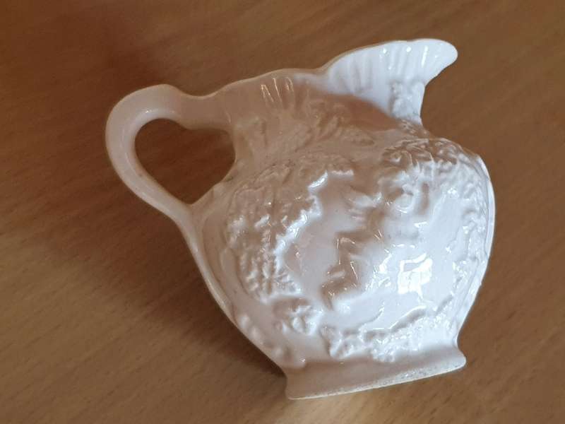 Small White Embossed Angel Figurine Ceramic Milk Jug - width 10cm height 8cm