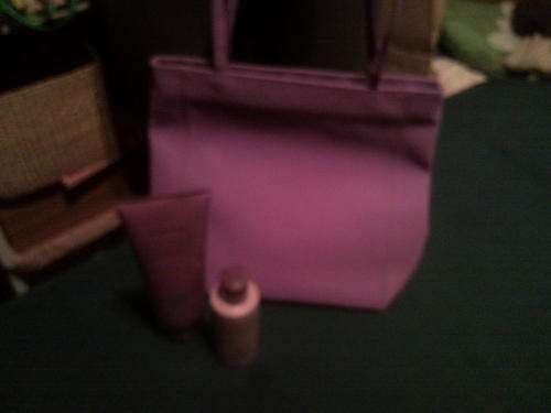 AVON PURPLE HANDBAG + 1 BUST GEL & 1 FIRMING LOTION
