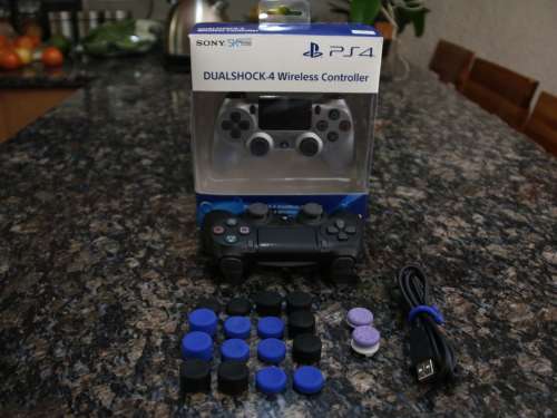 PS4 Pro 1TB Console & Extra DS4 Controller (Silver)