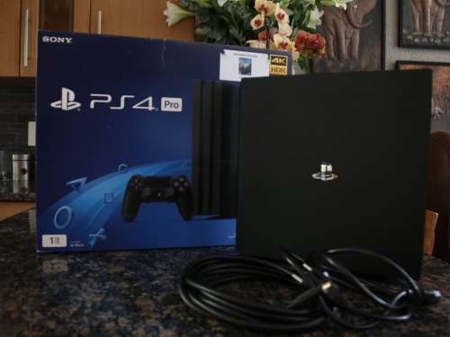 PS4 Pro 1TB Console & Extra DS4 Controller (Silver)