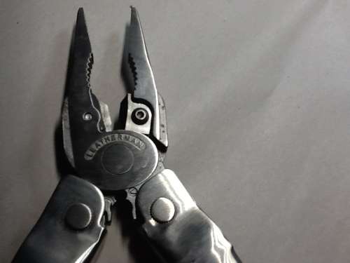***FREE SHIPPING***GENUINE LEATHERMAN300 SKELETOOL CX WITH POUCH...AT A FRACTION OF THE PRICE