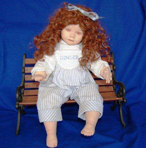 Beautiful Porcelain Doll (Soft Body). Cast Iron & Wood bench included - Doll length 560mm