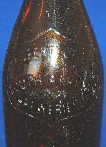 4 Vintage South African Beer Bottles & 1 Green Bottle - See Description for details.