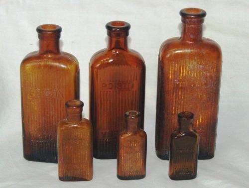 9 Assorted Vintage Poison Bottles - Tallest is 170mm - Read Description for details