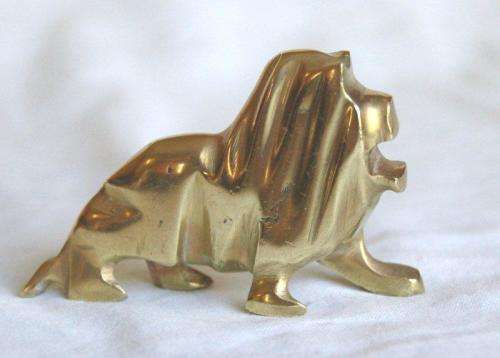 4 Stylized Solid Brass Animals - Lion, Leopard, Elephant and Hippo.Tallest is 50mm - Sold as 1 lot