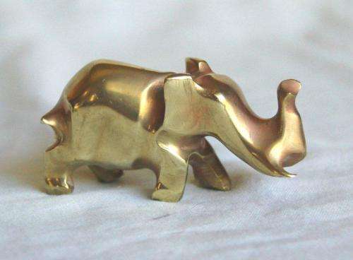 4 Stylized Solid Brass Animals - Lion, Leopard, Elephant and Hippo.Tallest is 50mm - Sold as 1 lot