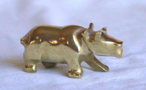 4 Stylized Solid Brass Animals - Lion, Leopard, Elephant and Hippo.Tallest is 50mm - Sold as 1 lot
