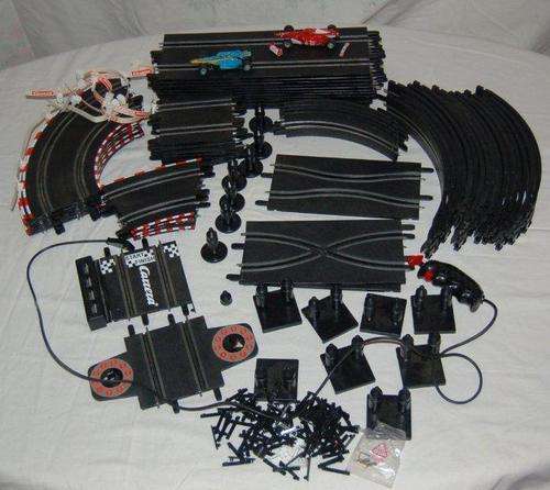 55 pieces of Carrera Track and a number of smaller bits