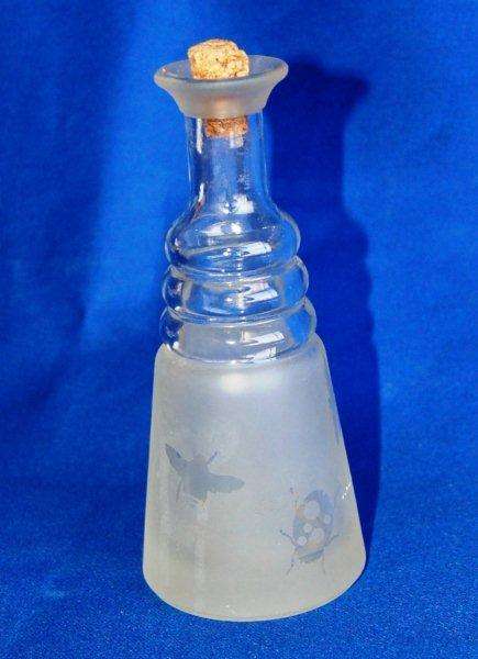 Glass jar with insect pattern
