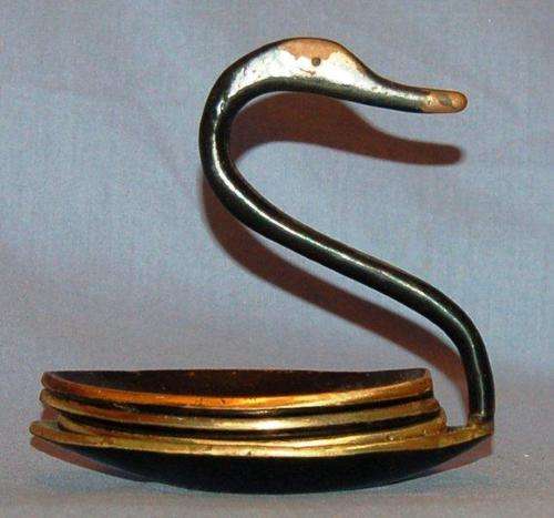 Nest of 4 small Cast Iron Ashtrays in the shape of a Swan -  Swan height 110mm - Ashtrays 95mm
