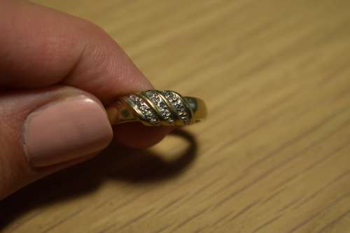9ct Gold Ring with 3 little diamonds