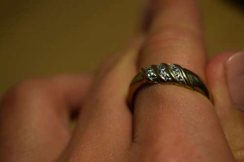 9ct Gold Ring with 3 little diamonds