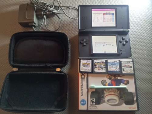 Nintendo DS lite Black console with 4 games Pokemon White, Pokemon Platinum Mario Cart and Brain