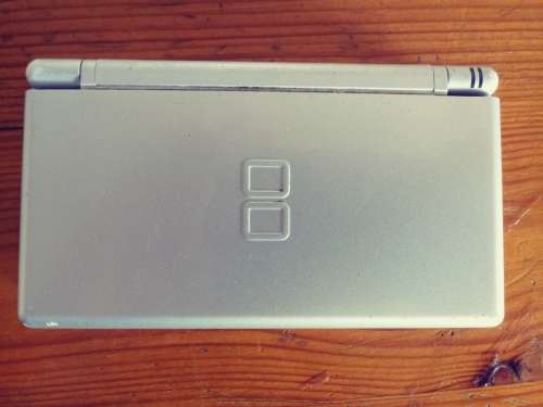 Nintendo DS grey( very used condition) works well. Read below.