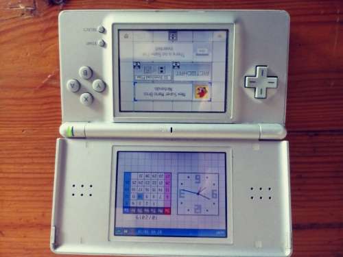 Nintendo DS grey( very used condition) works well. Read below.