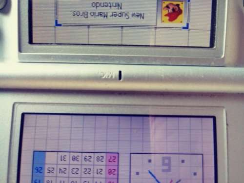 Nintendo DS grey( very used condition) works well. Read below.
