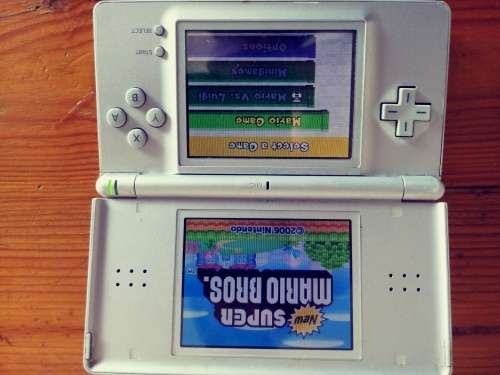 Nintendo DS grey( very used condition) works well. Read below.