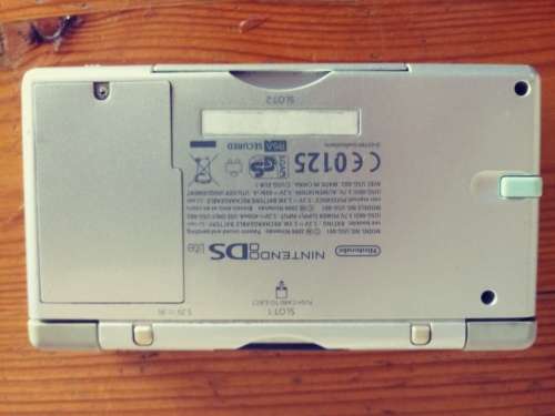 Nintendo DS grey( very used condition) works well. Read below.