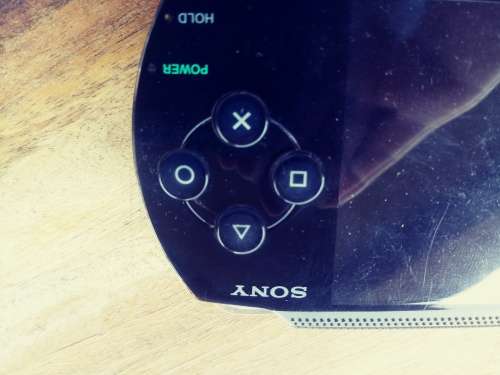 PSP 1000 ( Fair condition) with 8 games