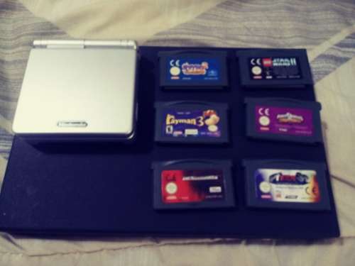 Game Boy Advance SP with 6 Games and Charger ( Good Condition)
